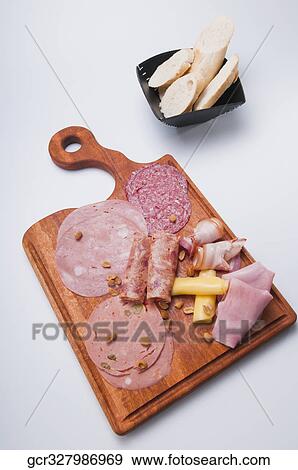 High angle view of assorted cold cuts and cheese on a platter View Large Photo Image Stock Photo - High angle view of assorted cold cuts and cheese on a platter. Fotosearch
