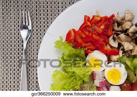 High angle view of boiled eggs with salad View Large Photo Image Stock Photo - High angle view of boiled eggs with salad. Fotosearch