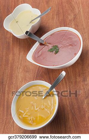 High angle view of bowls of assorted soups View Large Photo Image Stock Photo - High angle view of bowls of assorted soups. Fotosearch