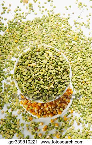 High angle view of bowls of green lentils and corn kernels View Large Photo Image Stock Image - High angle view of bowls of green lentils and corn kernels. Fotosearch
