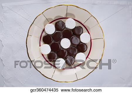 Stock Photography - High angle view of chocolate cream cookies. Fotosearch