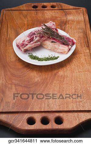 High angle view of chops marinated with herbs View Large Photo Image Stock Image - High angle view of chops marinated with herbs. Fotosearch