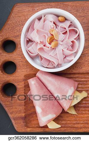High angle view of cold cuts and cheese rolls View Large Photo Image Stock Photograph - High angle view of cold cuts and cheese rolls. Fotosearch