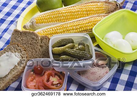 High angle view of cream cheese on a brown bread with fruits and boiled eggs View Large Photo Image Stock Photo - High angle view of cream cheese on a brown bread with fruits and boiled eggs. Fotosearch