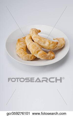 High angle view of croissants in a platter View Large Photo Image Stock Image - High angle view of croissants in a platter. Fotosearch