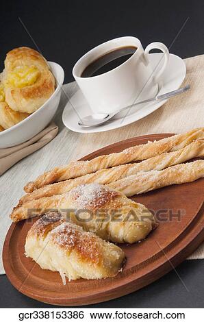 High angle view of Danish pastries served with coffee View Large Photo Image Stock Photograph - High angle view of Danish pastries served with coffee. Fotosearch