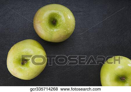 High angle view of granny smith apples View Large Photo Image Stock Photo - High angle view of granny smith apples. Fotosearch