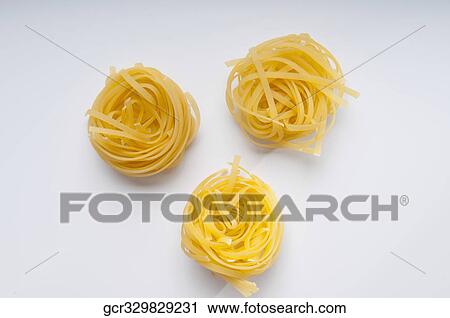 High angle view of pappardelle pasta View Large Photo Image Stock Image - High angle view of pappardelle pasta. Fotosearch
