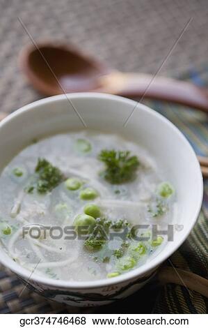High angle view of pea and noodle clear soup View Large Photo Image Stock Photo - High angle view of pea and noodle clear soup. Fotosearch