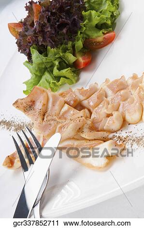High angle view of pepper garnish on octopus View Large Photo Image Stock Image - High angle view of pepper garnish on octopus. Fotosearch
