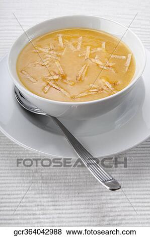 Stock Photo - High angle view of pumpkin soup. Fotosearch