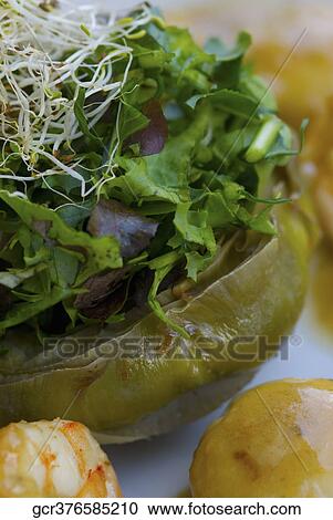 High angle view of salad stuffed artichoke View Large Photo Image Stock Image - High angle view of salad stuffed artichoke. Fotosearch