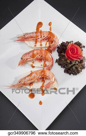 Stock Photograph - High angle view of shrimp starters. Fotosearch