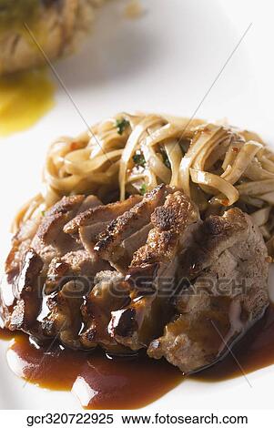 High angle view of sliced beef and fetuccine pasta View Large Photo Image Stock Photography - High angle view of sliced beef and fetuccine pasta. Fotosearch