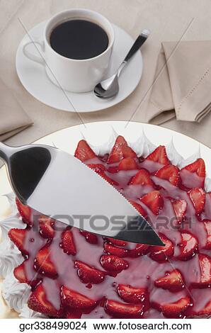 High angle view of strawberry meringue with a cup of coffee View Large Photo Image Picture - High angle view of strawberry meringue with a cup of coffee. Fotosearch