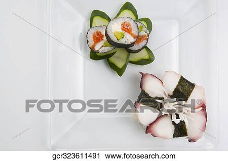 Stock Image - High angle view of sushi on a platter. Fotosearch