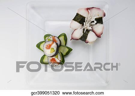 High angle view of sushi on a platter View Large Photo Image Stock Image - High angle view of sushi on a platter. Fotosearch