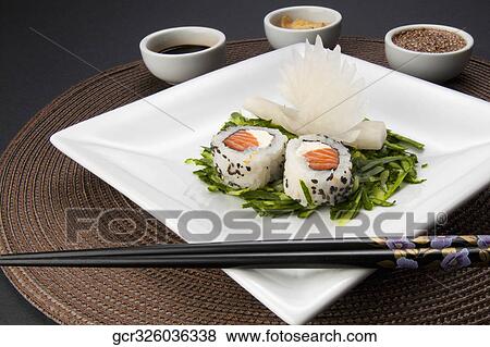High angle view of sushi served with condiments View Large Photo Image Stock Photo - High angle view of sushi served with condiments. Fotosearch