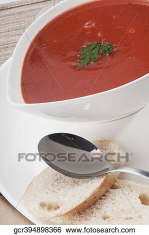 High angle view of tomato soup and bread View Large Photo Image Stock Photograph - High angle view of tomato soup and bread. Fotosearch