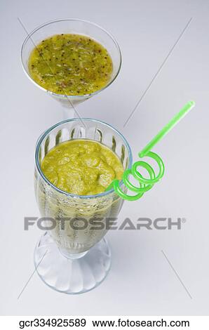High angle view of two glasses of cocktails View Large Photo Image Stock Photo - High angle view of two glasses of cocktails. Fotosearch