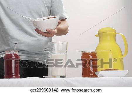 Man having breakfast View Large Photo Image Stock Image - Man having breakfast. Fotosearch