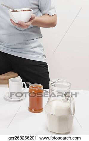 Man having breakfast View Large Photo Image Stock Image - Man having breakfast. Fotosearch