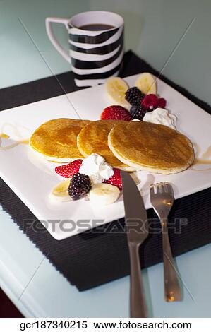 Pancakes with fresh fruits View Large Photo Image Stock Photography - Pancakes with fresh fruits. Fotosearch