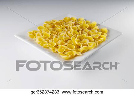Platter of uncooked francesine pasta View Large Photo Image Stock Image - Platter of uncooked francesine pasta. Fotosearch