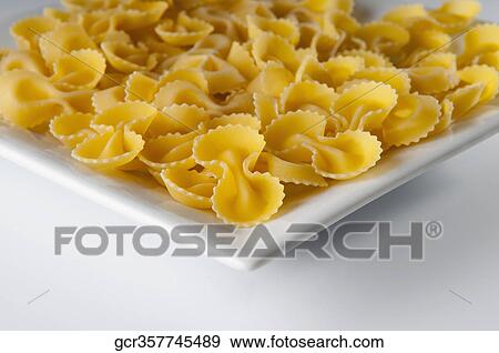 Platter of uncooked francesine pasta View Large Photo Image Stock Photo - Platter of uncooked francesine pasta. Fotosearch