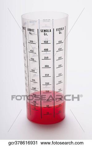 Red liquid in a measuring glass View Large Photo Image Stock Image - Red liquid in a measuring glass. Fotosearch