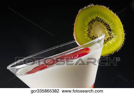 Strawberry slices in a glass of milk View Large Photo Image Stock Image - Strawberry slices in a glass of milk. Fotosearch