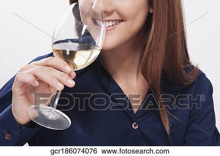 Woman drinking wine View Large Photo Image Stock Photograph - Woman drinking wine. Fotosearch
