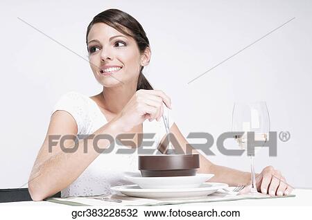 Woman eating soup and day dreaming View Large Photo Image Stock Image - Woman eating soup and day dreaming. Fotosearch