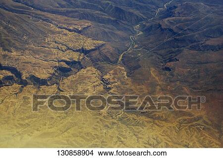 Aerial view of an arid landscape, Arizona, USA View Large Photo Image Picture - Aerial view of an arid landscape, Arizona, USA. Fotosearch