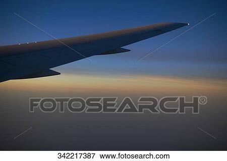 Airplane in the sky View Large Photo Image Stock Photo - Airplane in the sky. Fotosearch