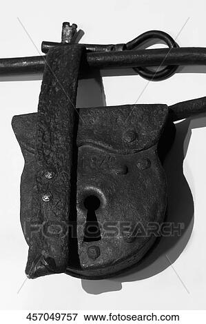 Antique padlock and a key View Large Photo Image Stock Photo - Antique padlock and a key. Fotosearch