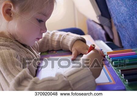 Baby girl coloring a picture View Large Photo Image Stock Photo - Baby girl coloring a picture. Fotosearch