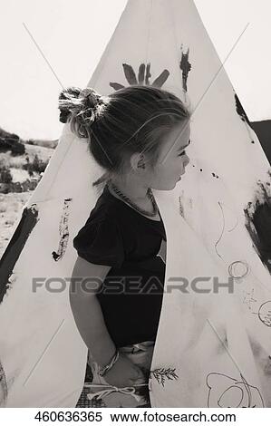 Baby girl looking out of a tent, Santa Fe, New Mexico, USA View Large Photo Image Stock Photography - Baby girl looking out of a tent, Santa Fe, New Mexico, USA. Fotosearch
