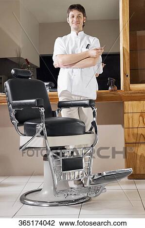 Barber in a salon View Large Photo Image Stock Image - Barber in a salon. Fotosearch