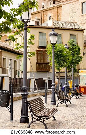 Benches in front of houses, Madrid, Spain View Large Photo Image Stock Photo - Benches in front of houses, Madrid, Spain. Fotosearch