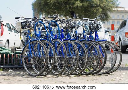Stock Photography - Bicycles parked in a row, Toledo, Spain. Fotosearch