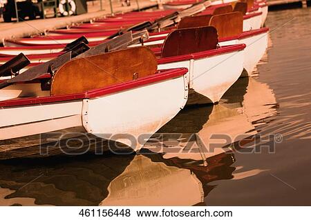 Boats moored in a lake, Paris, France View Large Photo Image Stock Photo - Boats moored in a lake, Paris, France. Fotosearch