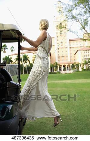 Bride in a golf cart, Biltmore Golf Course, Coral Gables, Florida, USA View Large Photo Image Stock Photography - Bride in a golf cart, Biltmore Golf Course, Coral Gables, Florida, USA. Fotosearch