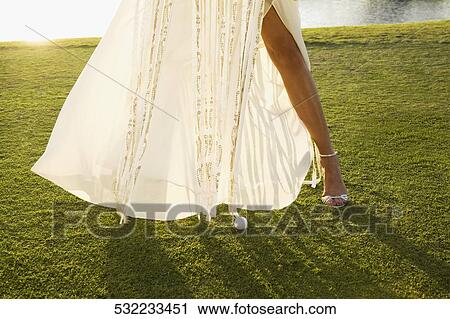 Bride standing in a golf course, Biltmore Golf Course, Coral Gables, Florida, USA View Large Photo Image Stock Image - Bride standing in a golf course, Biltmore Golf Course, Coral Gables, Florida, USA. Fotosearch