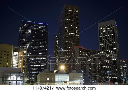Buildings lit up at night in a city, Los Angeles, California, USA View Large Photo Image Stock Photo - Buildings lit up at night in a city, Los Angeles, California, USA. Fotosearch