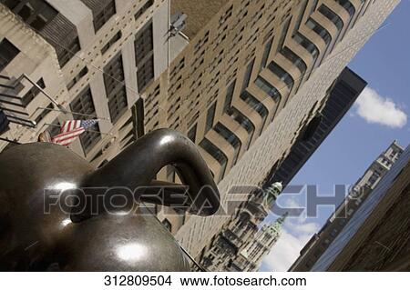 Bull statue with buildings in the background, Charging Bull, New York City, New York State, USA View Large Photo Image Picture - Bull statue with buildings in the background, Charging Bull, New York City, New York State, USA. Fotosearch