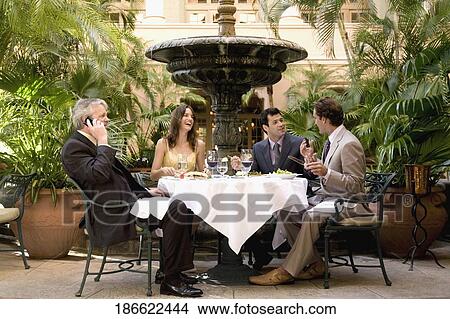 Business executives having lunch in a hotel, Biltmore Hotel, Coral Gables, Florida, USA View Large Photo Image Picture - Business executives having lunch in a hotel, Biltmore Hotel, Coral Gables, Florida, USA. Fotosearch