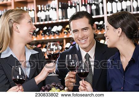 Business executives toasting with wine View Large Photo Image Stock Image - Business executives toasting with wine. Fotosearch