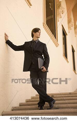 Businessman holding a file, Biltmore Hotel, Coral Gables, Florida, USA View Large Photo Image Stock Photograph - Businessman holding a file, Biltmore Hotel, Coral Gables, Florida, USA. Fotosearch