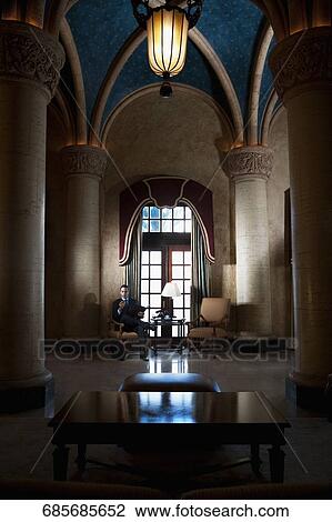 Businessman sitting in a hotel lobby, Biltmore Hotel, Coral Gables, Florida, USA View Large Photo Image Stock Image - Businessman sitting in a hotel lobby, Biltmore Hotel, Coral Gables, Florida, USA. Fotosearch